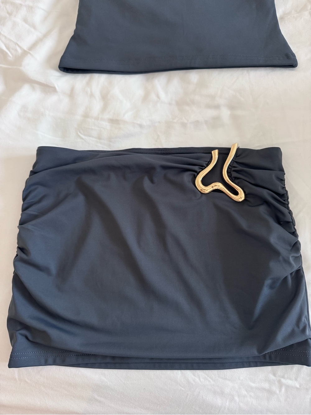 Edikted Charcoal Gray Ruched Mini Skirt with Gold Accent